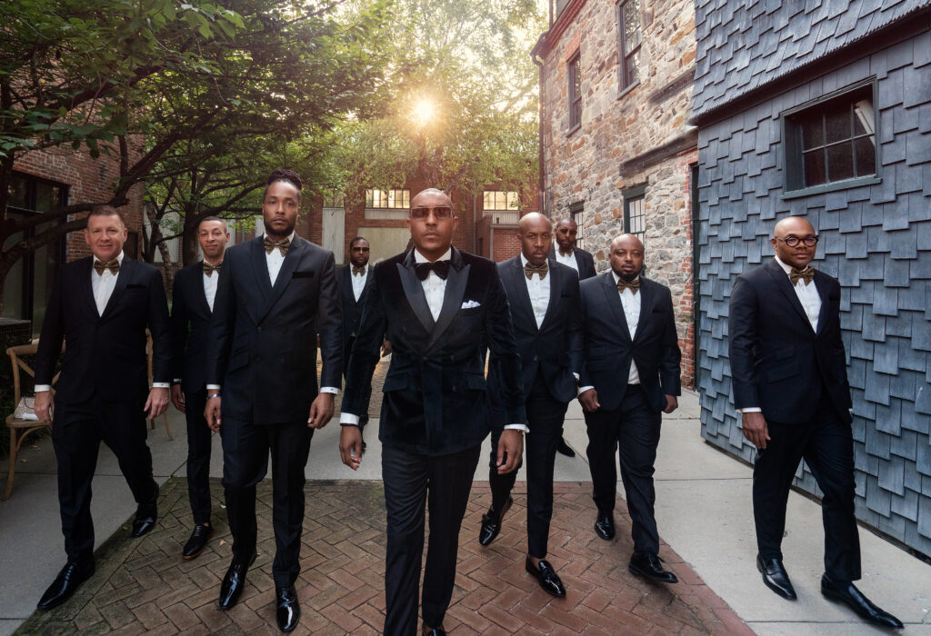 Grown men walking in with the Maryland groom rocking one of Kenny Kas custom double breasted pieces